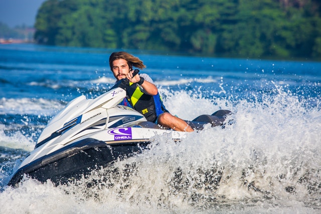 Jet ski instructor riding a personal water craft