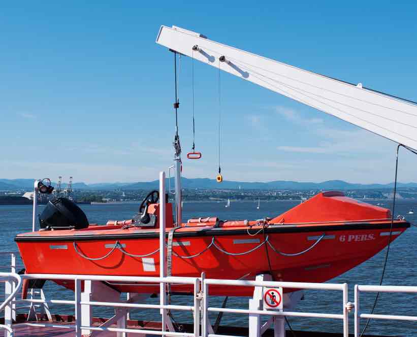 Lifeboat hanging on a deck of cruise ship