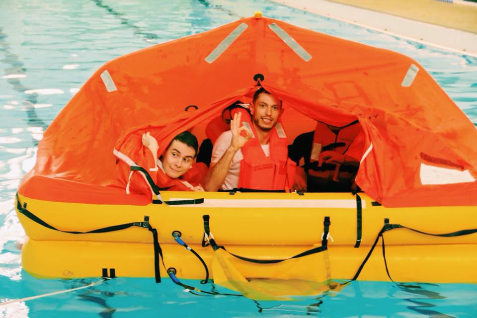 Crew member in a life raft